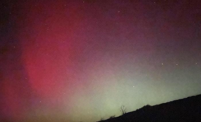 The aurora making an appearance in the Cambrian Mountains an official dark sky area of Mod Wales